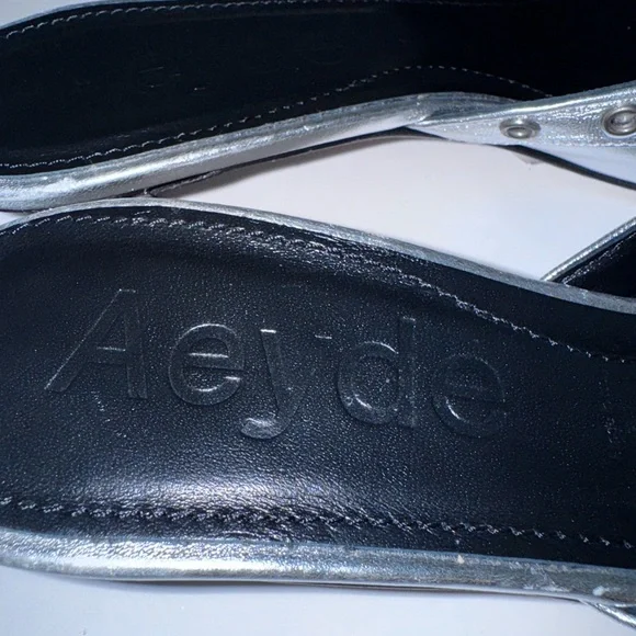 AEYDE Tania Kiltie Fringe Silver Metallic Mule Pumps 37=7